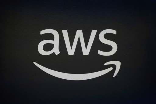 FILE - An AWS, Amazon Web Services, logo is displayed at LlamaCon 2025, an AI developer conference, in Menlo Park, Calif., Tuesday, April 29, 2025. (AP Photo/Jeff Chiu, File) FILE - An AWS, Amazon Web Services, logo is displayed at LlamaCon 2025, an AI developer conference, in Menlo Park, Calif., Tuesday, April 29, 2025. (AP Photo/Jeff Chiu, File)