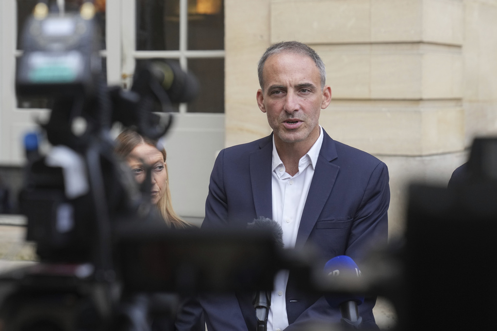 Raphael Glucksmann, co-president of French centre-left party, Place Publique, speaks to media following a meeting with French Prime Minister Francois Bayrou before a confidence vote, at the Hotel Matignon in Paris Tuesday, Sept. 2, 2025. (AP Photo/Thibault Camus)