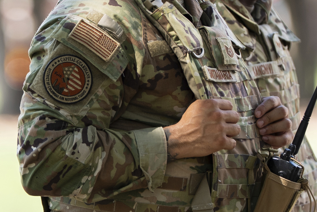 Members of the District of Columbia National Guard patrol along the National Mall, Saturday, Aug. 16, 2025, in Washington. (AP Photo/Julia Demaree Nikhinson)