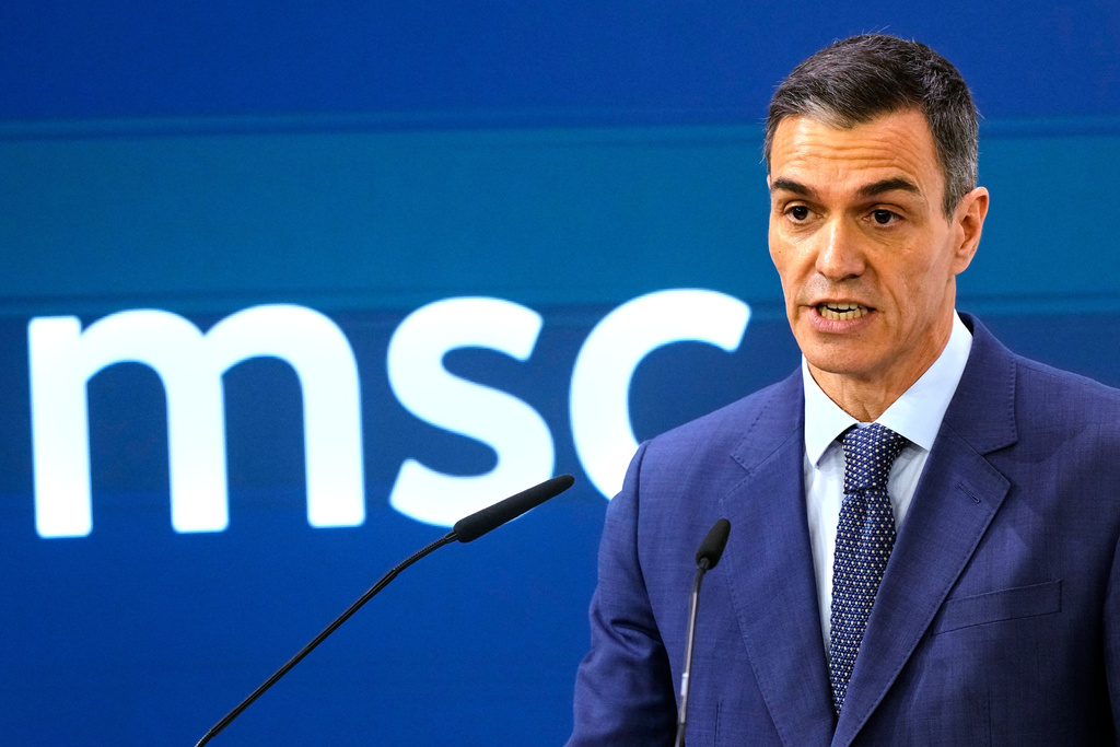 Spain's Prime Minister Pedro Sanchez speaks during a panel discussion at the Munich Security Conference in Munich, Germany, Saturday, Feb. 14, 2026. (AP Photo/Michael Probst)