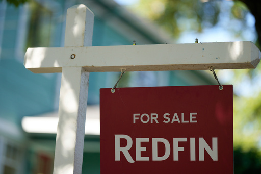 FILE - A "For Sale" sign is displayed outside a home on Friday, July 11, 2025, in Portland, Ore. (AP Photo/Jenny Kane, File) FILE - A "For Sale" sign is displayed outside a home on Friday, July 11, 2025, in Portland, Ore. (AP Photo/Jenny Kane, File)