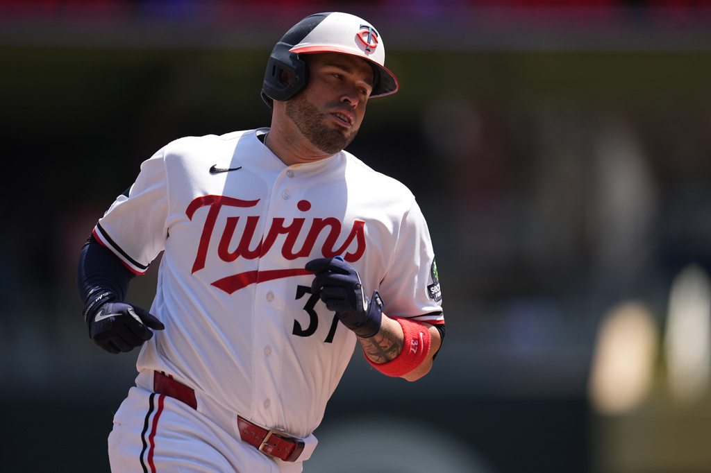 Minnesota Twins' Victor Caratini (37) runs the bases after hitting a solo home run during the second inning of a baseball game against the Houston Astros, Wednesday, May 20, 2026, in Minneapolis. (AP Photo/Abbie Parr)