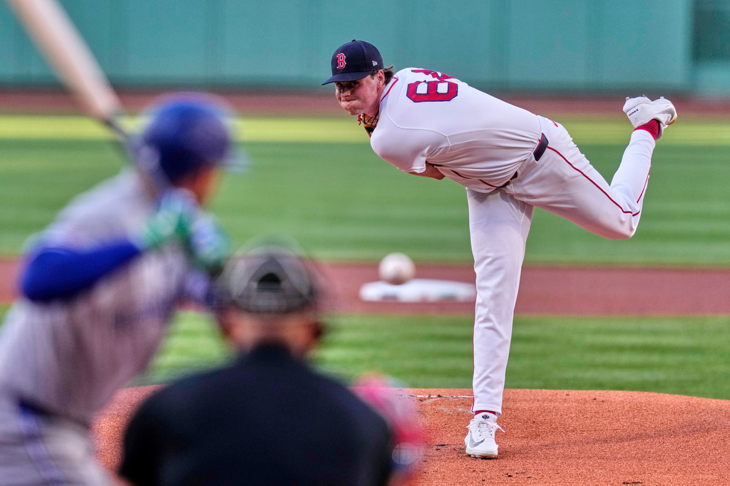Boston Red Sox starting pitcher Jake Bennett delivers during the first inning of a baseball game against the Toronto Blue Jays, Wednesday, June 17, 2026, in Boston. (AP Photo/Charles Krupa)