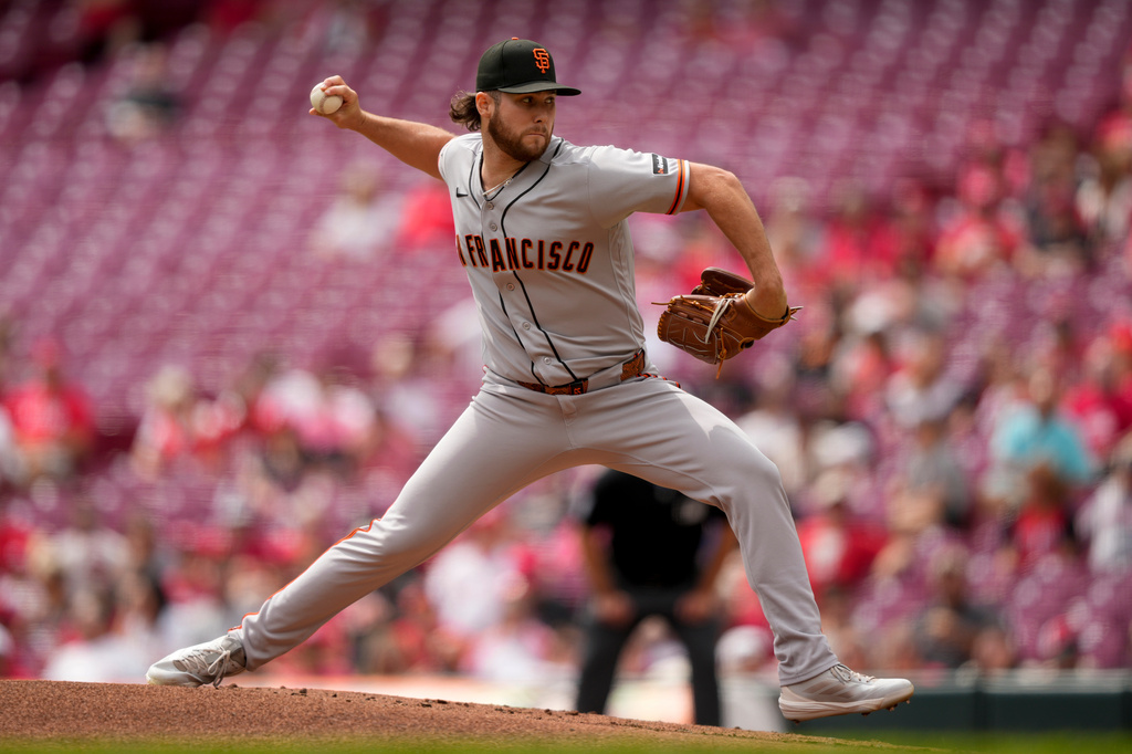 San Francisco Giants pitcher Landen Roupp throws during the first inning of a baseball game against the Cincinnati Reds in Cincinnati, Thursday, April 16, 2026. (AP Photo/Carolyn Kaster)