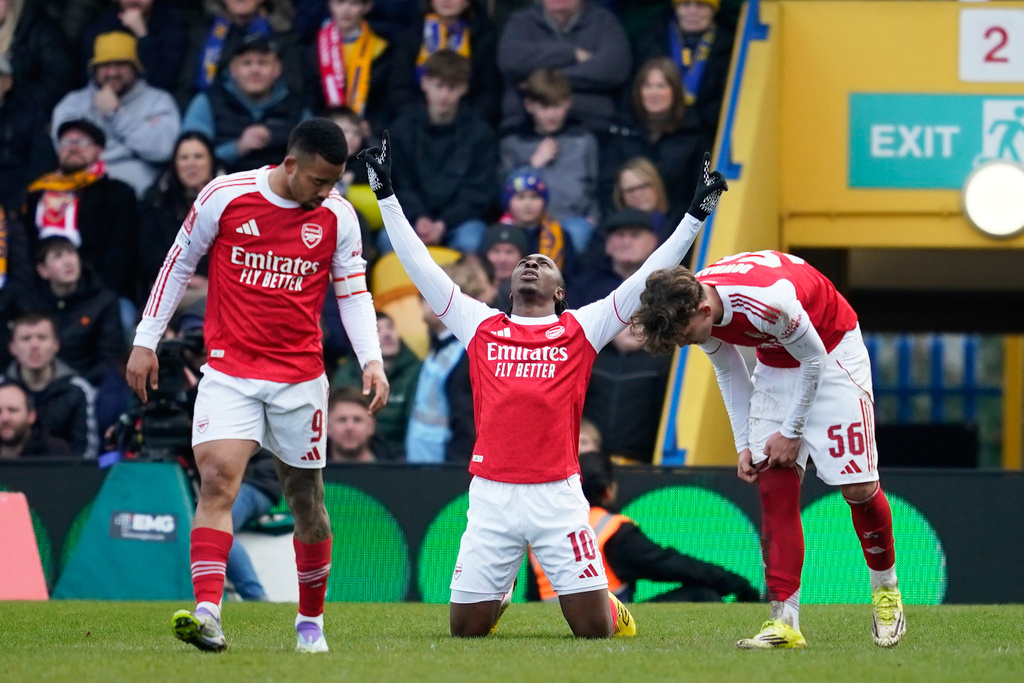 Arsenal's Eberechi Eze celebrates after scoring his side's second goal during the English FA Cup soccer match between Mansfield Town and Arsenal in Mansfield, England, Saturday, March 7, 2026.(AP Photo/Dave Thompson)