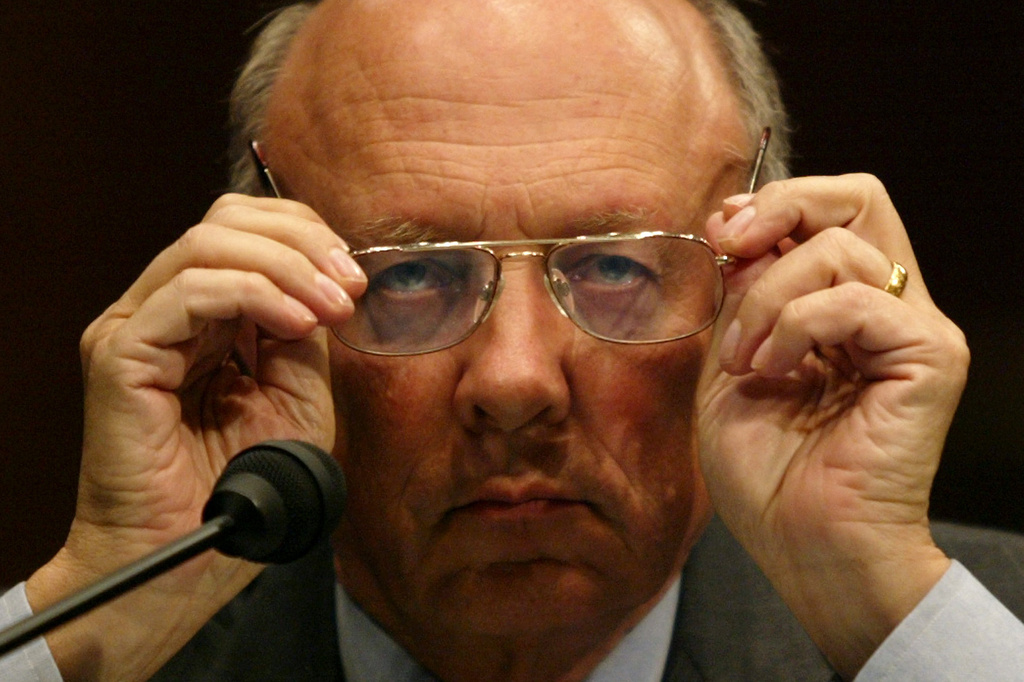 FILE - Former CIA director R. James Woolsey adjusts his glasses during a Senate Intelligence Committee hearing July 20, 2004, in Washington. (AP Photo/Evan Vucci, File)