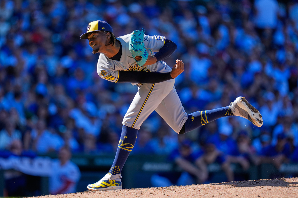 Milwaukee Brewers pitcher Abner Uribe throws against the Chicago Cubs during the eighth inning of a baseball game Thursday, Aug. 21, 2025, in Chicago. (AP Photo/Erin Hooley)