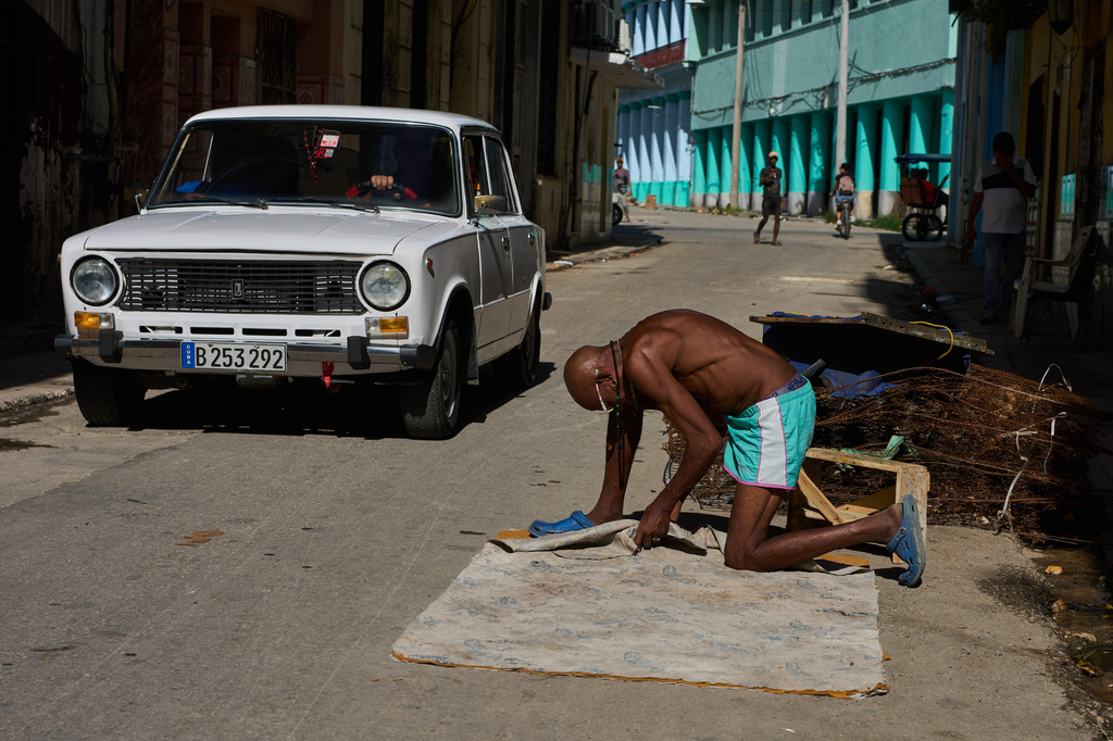 A man repairs a mattress in Havana, Cuba, Tuesday, June 9, 2026. (AP Photo/Ramon Espinosa)