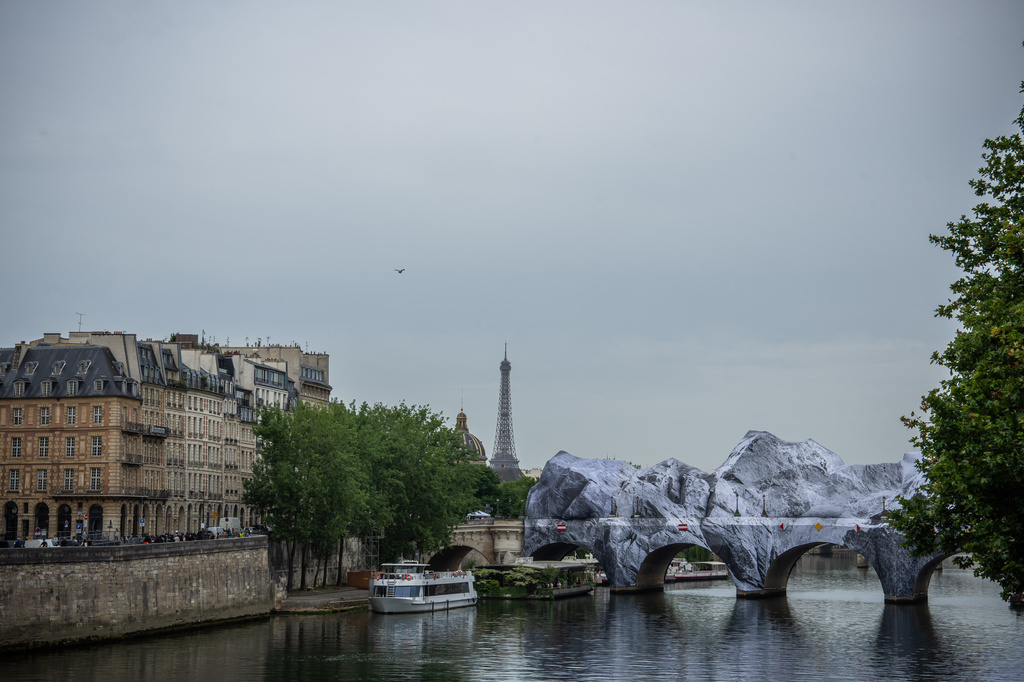 Artwork "The Pont Neuf Cave" by French street artist JR on the Pont Neuf bridge opens to the public from June 15 to 28, in Paris, Tuesday, June 16, 2026. (AP Photo/Aurelien Morissard)