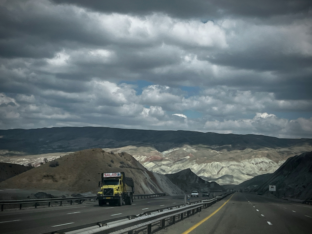 Vehicles drive along along Road 2 between Zanjan and Tabriz, Iran, Thursday, April 9, 2026. (AP Photo/Francisco Seco)