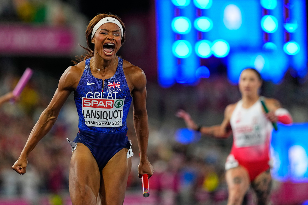 Britain's Imani Lansiquot anchors her team to the gold medal in the women's 4 X 100 meters relay final at the European Athletics Championships in Birmingham, England, Saturday, Aug. 15, 2026. (AP Photo/Petr David Josek)