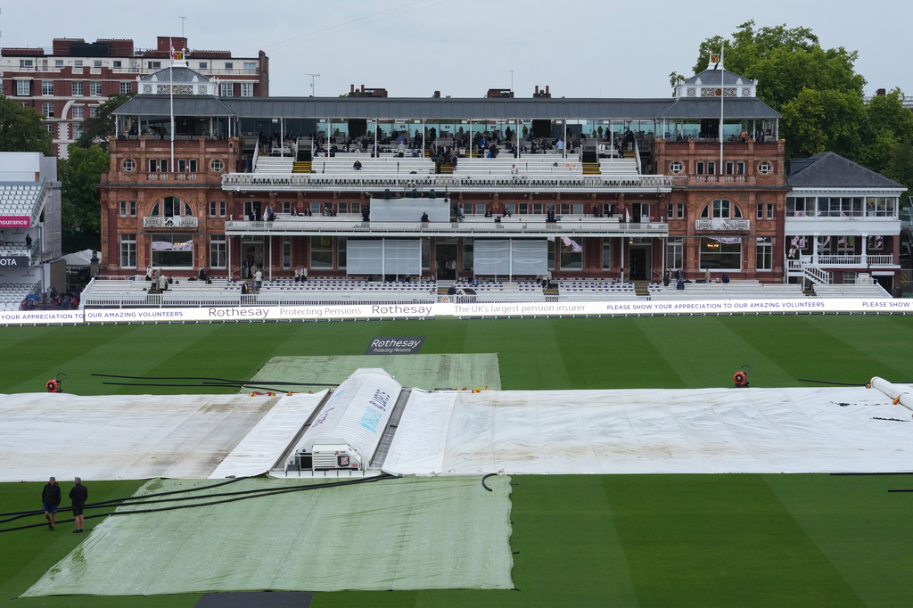 Rain covers are on the playing surface at the Lord's cricket ground ahead of the second cricket test match between England and Pakistan in London, Thursday, Aug. 27, 2026. (AP Photo/Dave Shopland)