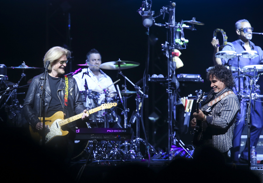 FILE - Daryl Hall and John Oates of Hall and Oates perform at the BOK Center in Tulsa, May 4, 2017. (Jessie Wardarski/Tulsa World via AP, File)