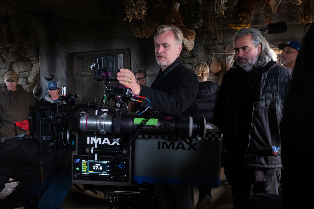 This image released by Universal Pictures shows director Christopher Nolan, center, with cinematographer Hoyte van Hoytema on set of "The Odyssey." (Melinda Sue Gordon/Universal Pictures via AP)