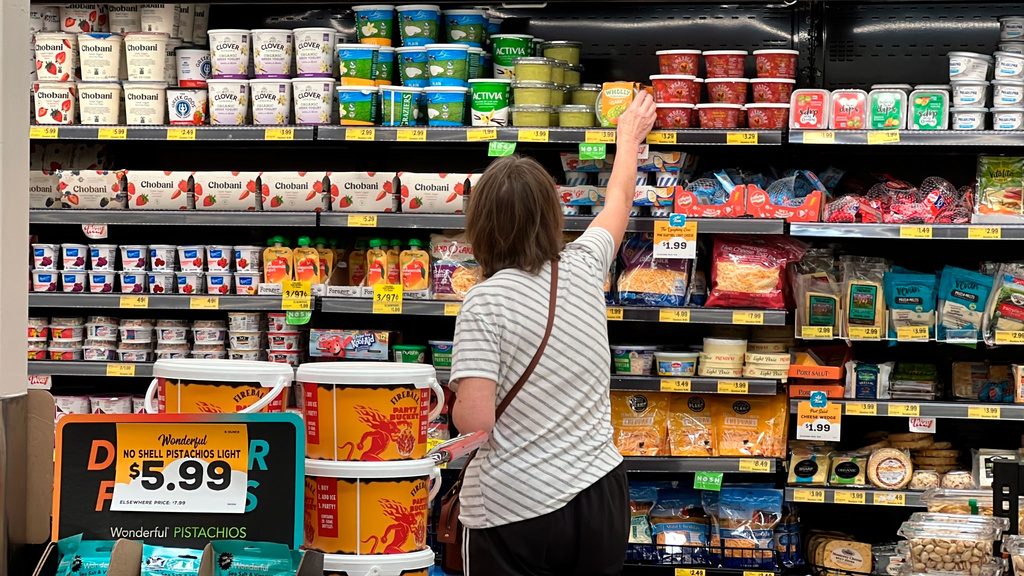 FILE - A customer looks at items at a Grocery Outlet store in Pleasanton, Calif.,. on Sept. 15, 2022. (AP Photo/Terry Chea, File)