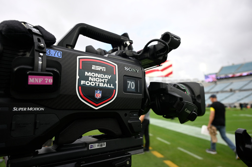 FILE - An ESPN Monday Night Football logo is viewed on a broadcast camera before an NFL football game between the Jacksonville Jaguars and the Kansas City Chiefs, Monday, Oct. 6, 2025, in Jacksonville, Fla. (AP Photo/Phelan M. Ebenhack, File) FILE - An ESPN Monday Night Football logo is viewed on a broadcast camera before an NFL football game between the Jacksonville Jaguars and the Kansas City Chiefs, Monday, Oct. 6, 2025, in Jacksonville, Fla. (AP Photo/Phelan M. Ebenhack, File)