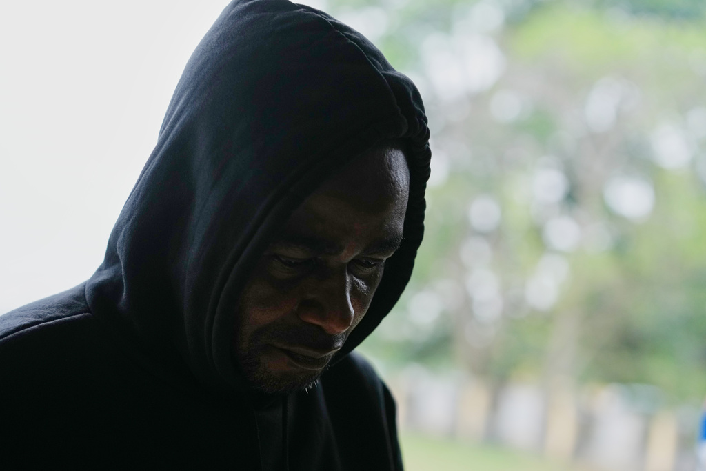 Adeniyi Mobolaji Kayode, 46, the driver in a car crash that injured former heavyweight champion Anthony Joshua and killed his two friends in Nigeria, leaves after a hearing at the magistrates court, in Sagamu, south west Nigeria, Tuesday, Jan. 20, 2026. (AP Photo/Sunday Alamba)