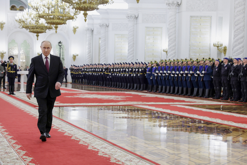 Russian President Vladimir Putin attends a ceremony to present the Order of Zhukov to the Presidential Regiment of the Russian Federal Guard Service at the Kremlin's St. George Hall in Moscow, Tuesday, June 23, 2026. (Gavriil Grigorov/Sputnik, Kremlin Pool Photo via AP)