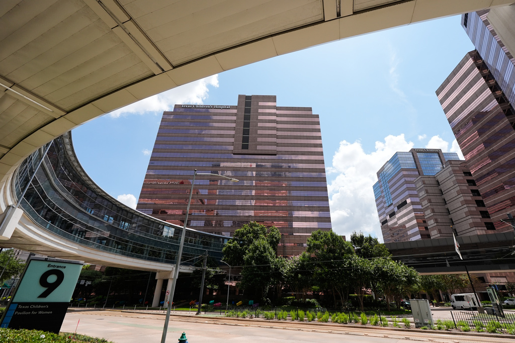 A portion of the Texas Children's Hospital campus is seen on Friday, Aug. 7, 2026, in Houston. (AP Photo/Ashley Landis)