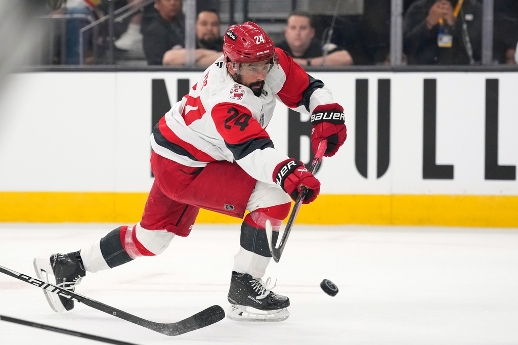 Carolina Hurricanes right wing Seth Jarvis shoots the puck during the first period in Game 3 of the NHL hockey Stanley Cup Final series against the Vegas Golden Knights, Saturday, June 6, 2026, in Las Vegas. (AP Photo/John Locher)
