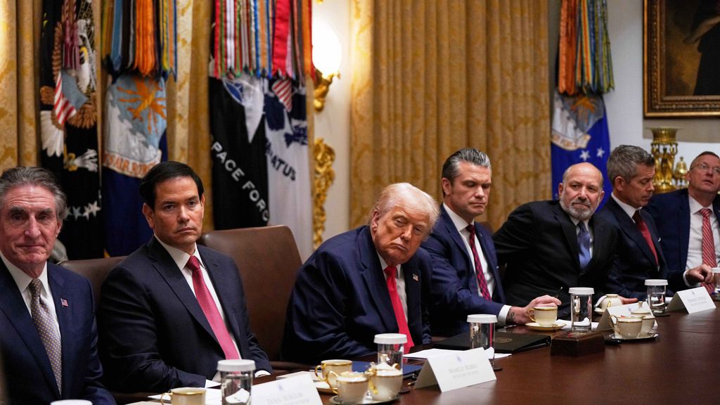 President Donald Trump listens during a Cabinet meeting at the White House, Tuesday, Dec. 2, 2025, in Washington. (AP Photo/Julia Demaree Nikhinson)
