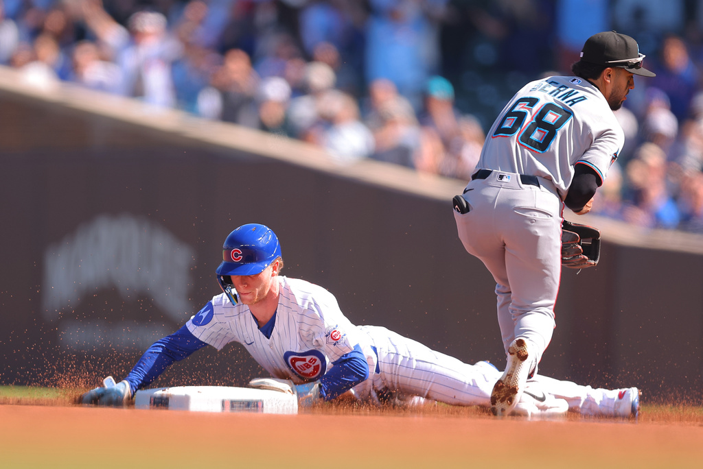 Chicago Cubs' Pete Crow-Armstrong steals second base for his 40th steal of the season during the first inning of a baseball game against the Miami Marlins, Thursday , Sept. 24, 2026, in Chicago. (AP Photo/Melissa Tamez)