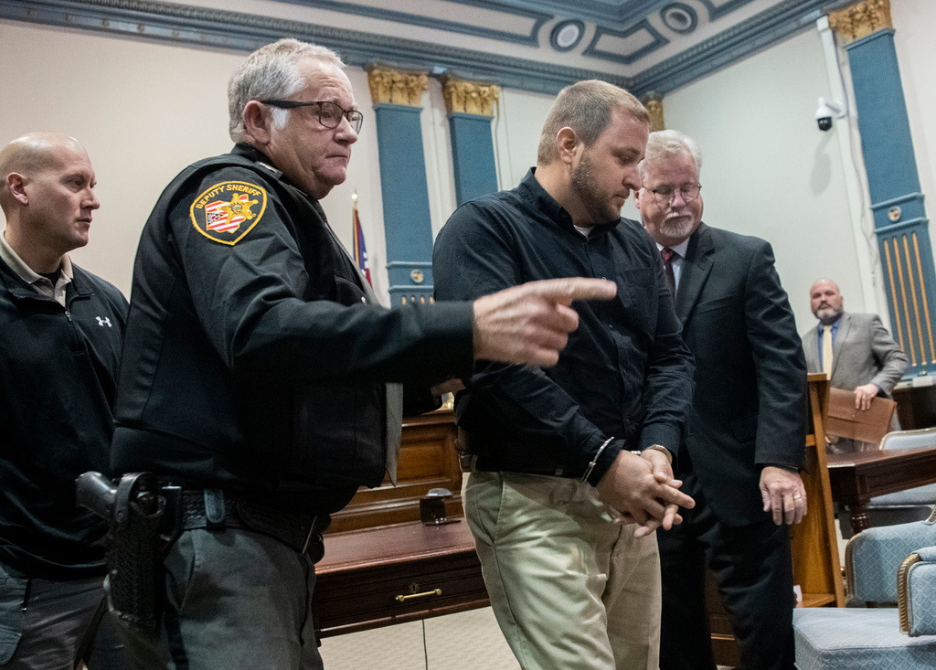 Jeriah Mast, a former missionary for Christian Aid Ministries, is taken into custody after his sentencing at Holmes County Courthouse Tuesday, Nov. 5, 2019 in Millersburg, Ohio. (Lake Fong/Pittsburgh Post-Gazette via AP)