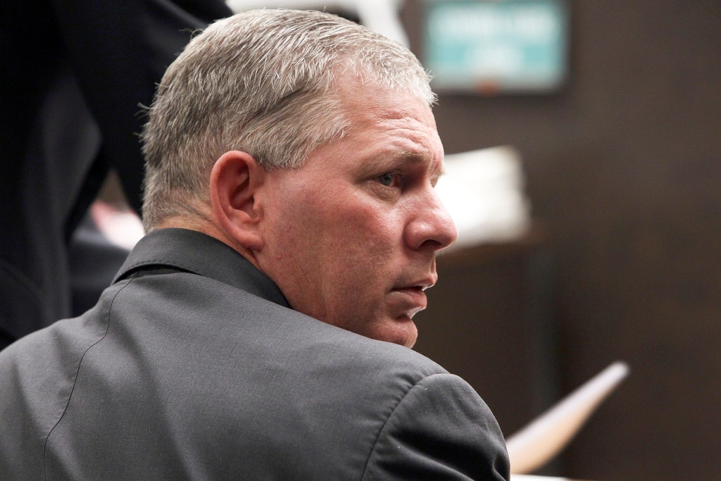 FILE - Former baseball player Lenny Dykstra sits during his sentencing for grand theft auto in Los Angeles, on Dec. 3, 2012. (AP Photo/Nick Ut, File)