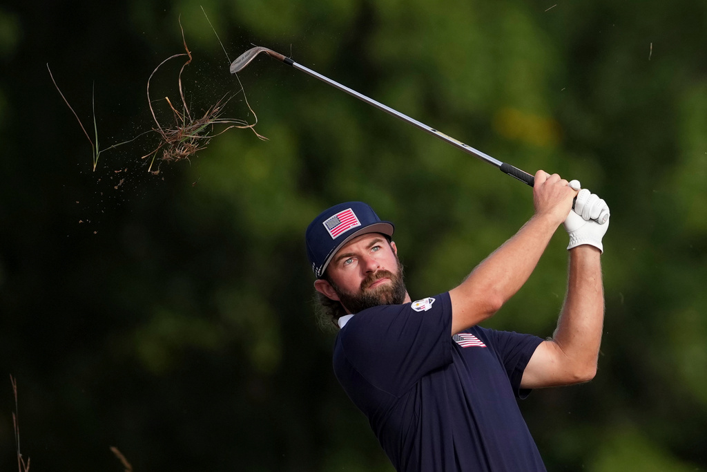 United States' Cameron Young hits from the rough on the 11th hole at Bethpage Black golf course during the Ryder Cup golf tournament, Saturday, Sept. 27, 2025, in Farmingdale, N.Y. (AP Photo/Matt Slocum)