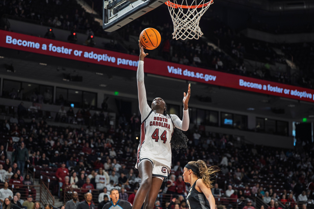 South Carolina guard Agot Makeer (44) shoots the ball over a Vanderbilt defender during the first half of an NCAA college basketball game against Vanderbilt Sunday, Jan. 25, 2026, in Columbia, S.C. (AP Photo/David Yeazell)