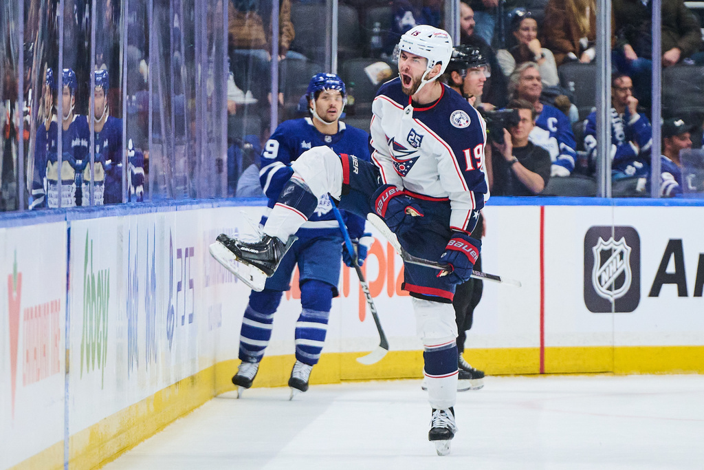 Columbus Blue Jackets' Adam Fantilli (19) celebrates his game-winning goal against the Toronto Maple Leafs in overtime NHL hockey action in Toronto, on Thursday, Nov. 20, 2025. (Sammy Kogan/The Canadian Press via AP)