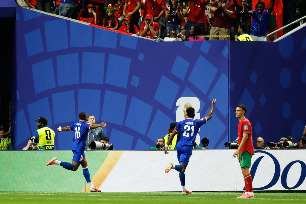 Haiti's Lenny Joseph (16) celebrates after Morocco goalkeeper Yassine Bounou scored an own goal during the World Cup Group C soccer match between Morocco and Haiti in Atlanta, Wednesday, June 24, 2026. (AP Photo/Erik S. Lesser)
