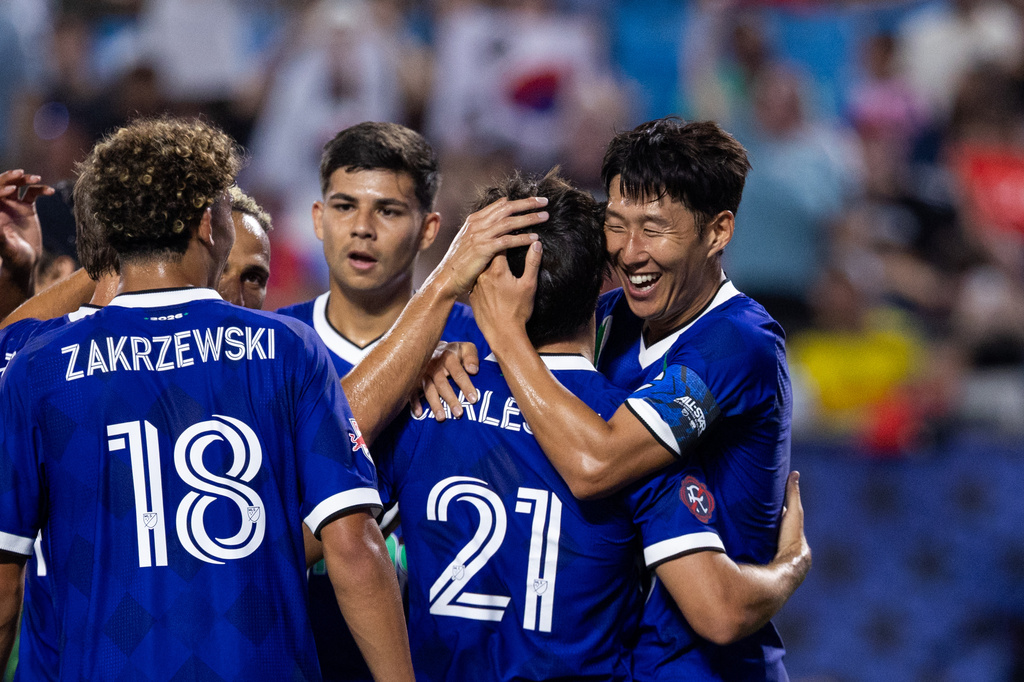 MLS All-Star Son Heung-min (7) celebrates after scoring with Carles Gil (21) during the MLS All-Star soccer game Wednesday, July 29, 2026, in Charlotte, N.C. (AP Photo/Scott Kinser)