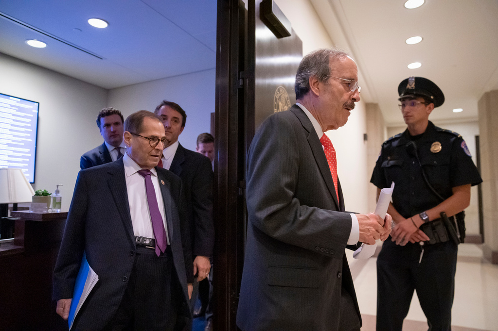 FILE - Rep. Jerrold Nadler, chairman of the House Judiciary Committee, left, and Rep. Eliot Engel, chairman of the House Foreign Affairs Committee, right, leave a news conference where they discussed the next steps of the impeachment investigation of President Donald Trump, at the Capitol in Washington, Thursday, Oct. 31, 2019. (AP Photo/J. Scott Applewhite, File)