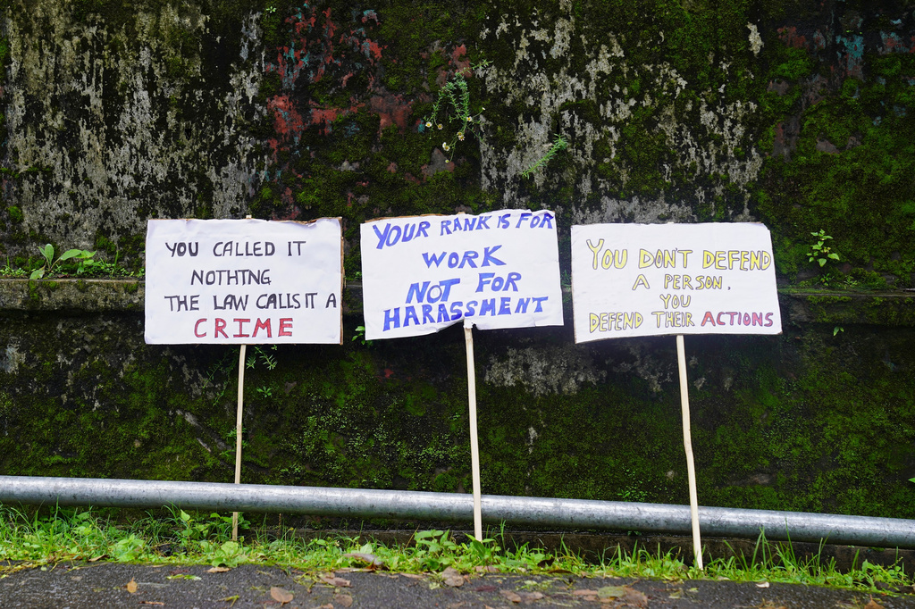 Placards are left leaning on a wall during a protest against rising cases of sexual violence against women and demanding justice for victims, in Kohima, capital of the northeastern Indian state of Nagaland, Friday, June 19, 2026. (AP Photo/Yirmiyan Arthur)
