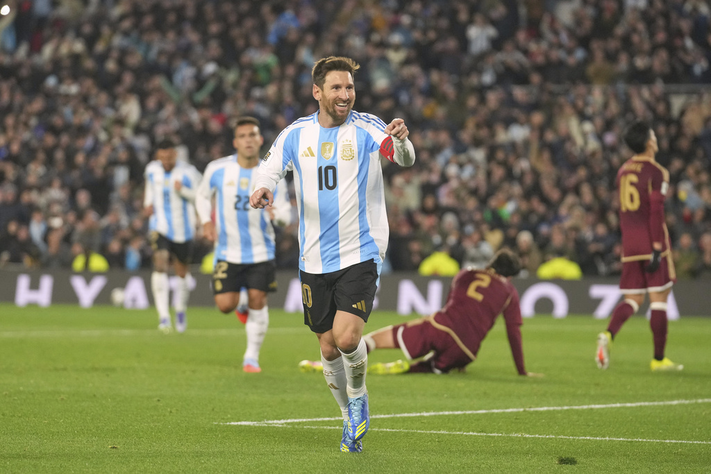 Argentina's Lionel Messi celebrates scoring his side's third goal against Venezuela during a World Cup 2026 qualifying soccer match at the Monumental stadium in Buenos Aires, Argentina, Thursday, Sept. 4, 2025. (AP Photo/Gustavo Garello)