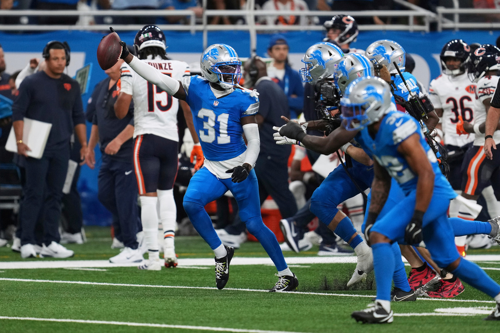 FILE - Detroit Lions safety Kerby Joseph (31) celebrates his interception against the Chicago Bears during an NFL football game in Detroit, Sept. 14, 2025. (AP Photo/Paul Sancya, File)