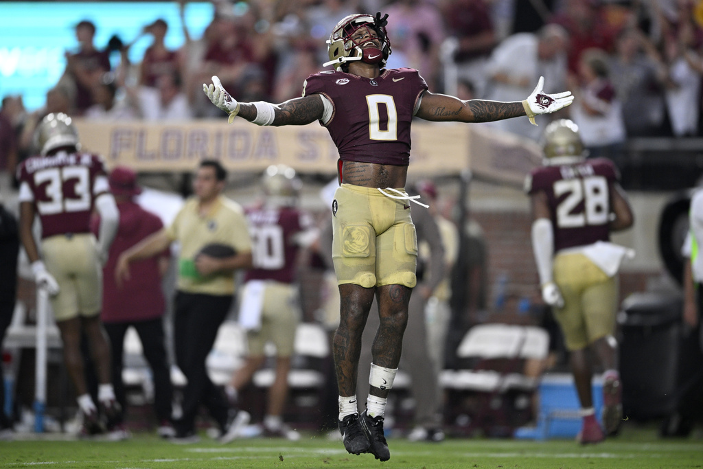 Florida State defensive back Earl Little Jr. (0) celebrates after a failed fourth-down conversion attempt by Alabama during the second half of an NCAA college football game, Saturday, Aug. 30, 2025, in Tallahassee, Fla. (AP Photo/Phelan M. Ebenhack)