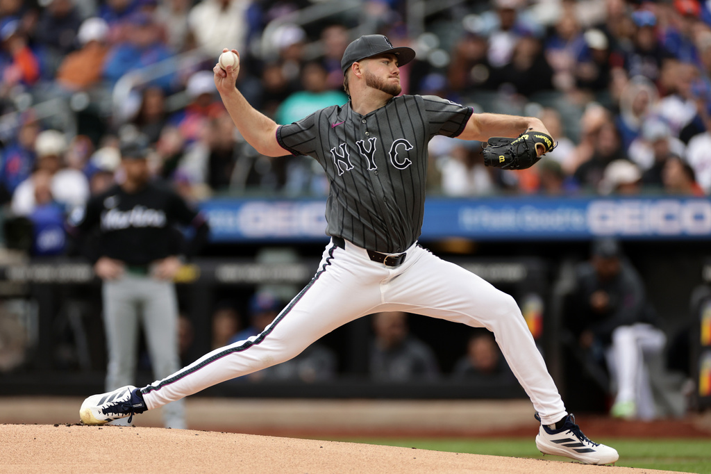 New York Mets pitcher Christian Scott throws during the first inning of a baseball game against the Miami Marlins, Saturday, May 30, 2026, in New York. (AP Photo/Adam Hunger)