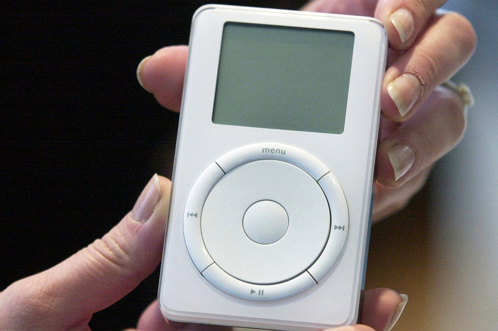FILE - An iPod is displayed after its introduction by Apple CEO Steve Jobs during a news conference, Oct. 23, 2001, in Cupertino, Calif. (AP Photo/Julie Jacobson, File)