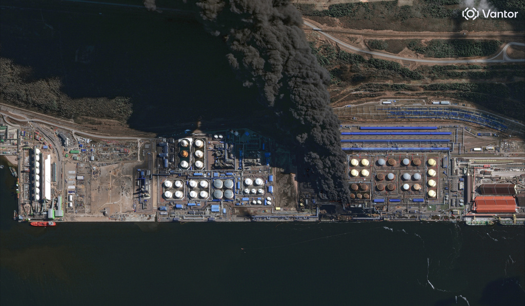 This satellite image provided by Vantor shows smoke rising following a drone strike, at the Ust-Luga oil terminal on the Baltic Sea, in Russia, on March 27, 2026. (Satellite image ©2026 Vantor via AP)