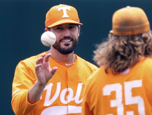 FILE - Tennessee head coach Tony Vitello, left, talks with pitcher Kirby Connell before an NCAA college baseball super regional game against Notre Dame, June 11, 2022, in Knoxville, Tenn. (AP Photo/Randy Sartin, File) FILE - Tennessee head coach Tony Vitello, left, talks with pitcher Kirby Connell before an NCAA college baseball super regional game against Notre Dame, June 11, 2022, in Knoxville, Tenn. (AP Photo/Randy Sartin, File)