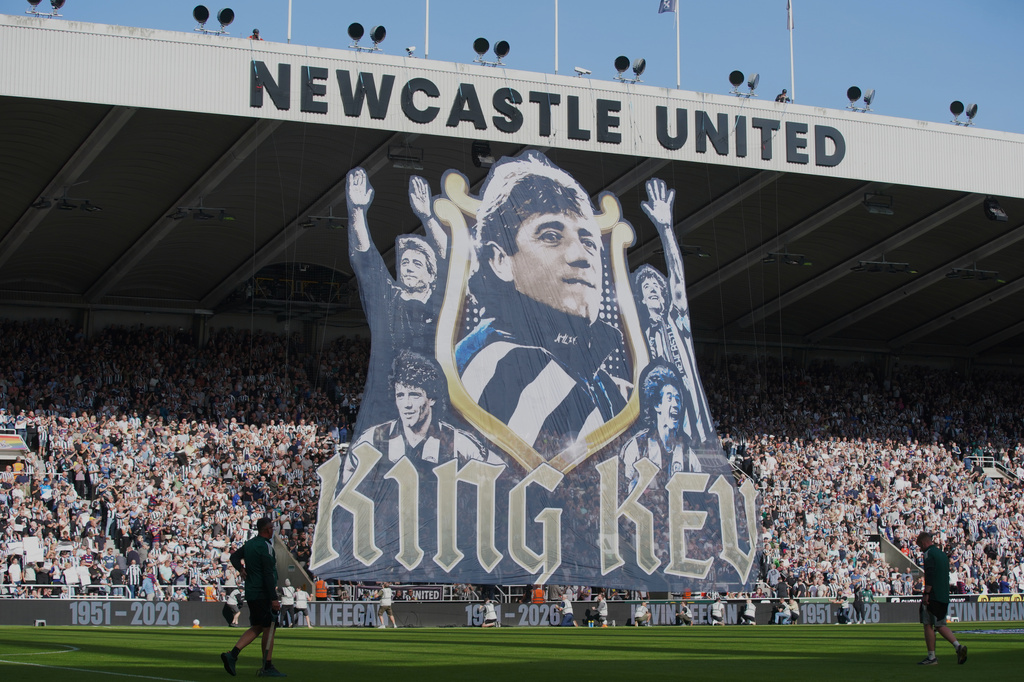 A banner featuring English football player and manager Kevin Keegan is displayed during the English Premier League soccer match between Newcastle United and Liverpool in Newcastle, England, Sunday, Aug. 23, 2026. (AP Photo/Ian Hodgson)