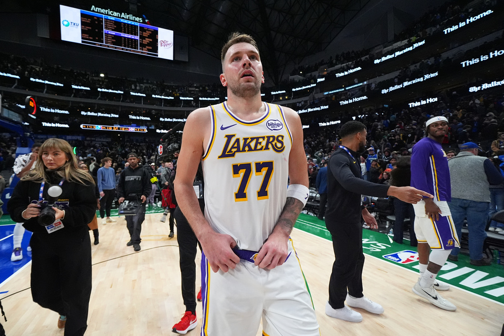 Los Angeles Lakers guard Luka Doncic looks on following an NBA basketball game against the Dallas Mavericks Saturday, Jan. 24, 2026, in Dallas. (AP Photo/Julio Cortez)