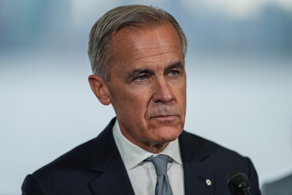 Canadian Prime Minister Mark Carney listens during an announcement about funding for oceans protection, in North Vancouver, British Columbia, Tuesday, Sept. 29, 2026. (Darryl Dyck/The Canadian Press via AP)