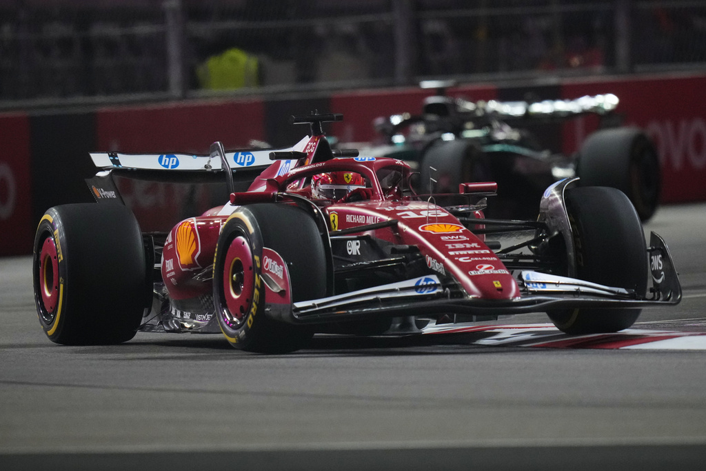 Ferrari driver Charles Leclerc of Monaco steers through a turn during a practice session for the Formula One U.S. Grand Prix auto race in Las Vegas, Thursday, Nov. 20, 2025. (AP Photo/Eric Gay)