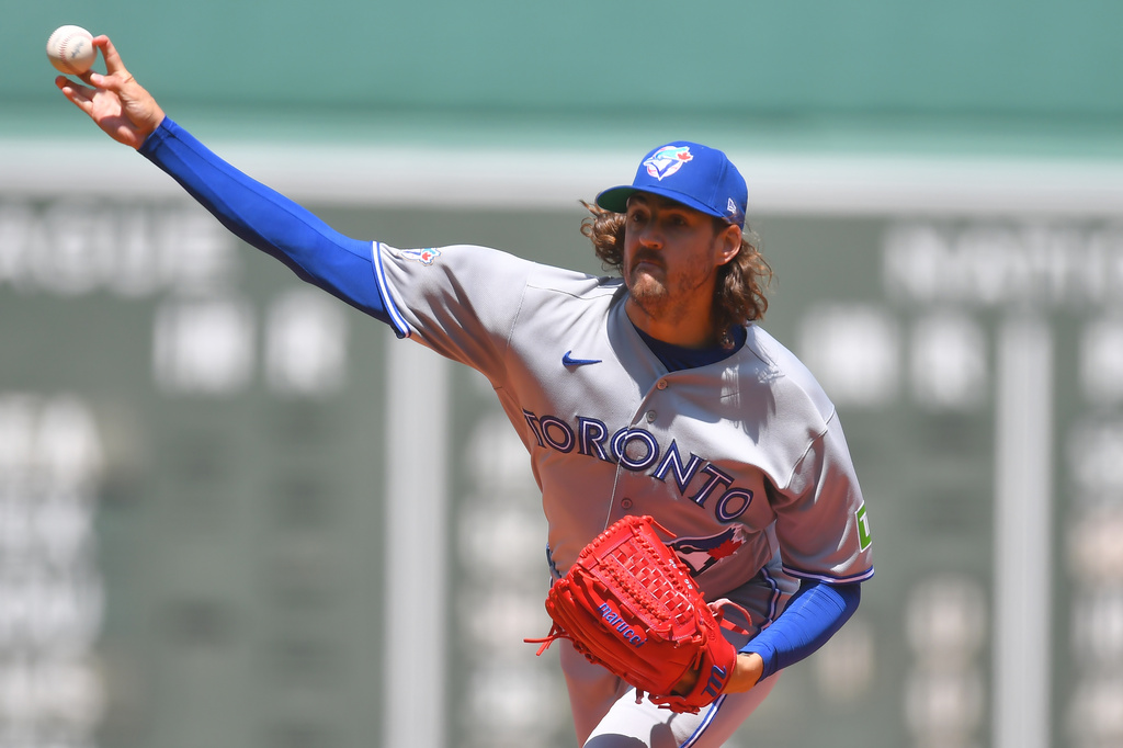 Toronto Blue Jays' Kevin Gausman delivers a pitch to a Boston Red Sox batter in the first inning of a baseball game, Sunday, July 26, 2026, in Boston. (AP Photo/Steven Senne)