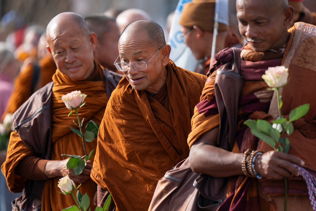Buddhist monks participate in the, "Walk For Peace," Thursday, Jan. 8, 2026, in Saluda, S.C. (AP Photo/Allison Joyce)