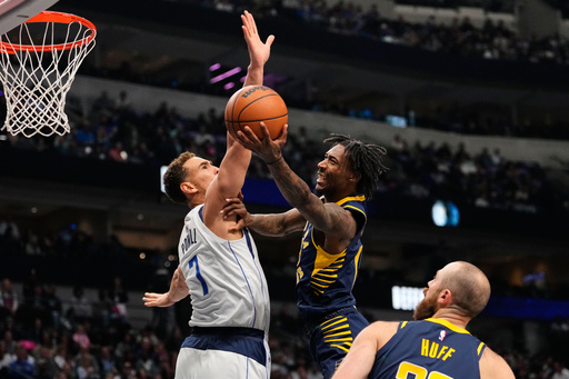 Indiana Pacers guard Quenton Jackson (29) leaps to the basket for a shot as Dallas Mavericks' Dwight Powell (7) defends in the first half of an NBA basketball game Wednesday, Oct. 29, 2025, in Dallas. (AP Photo/Tony Gutierrez) Indiana Pacers guard Quenton Jackson (29) leaps to the basket for a shot as Dallas Mavericks' Dwight Powell (7) defends in the first half of an NBA basketball game Wednesday, Oct. 29, 2025, in Dallas. (AP Photo/Tony Gutierrez)