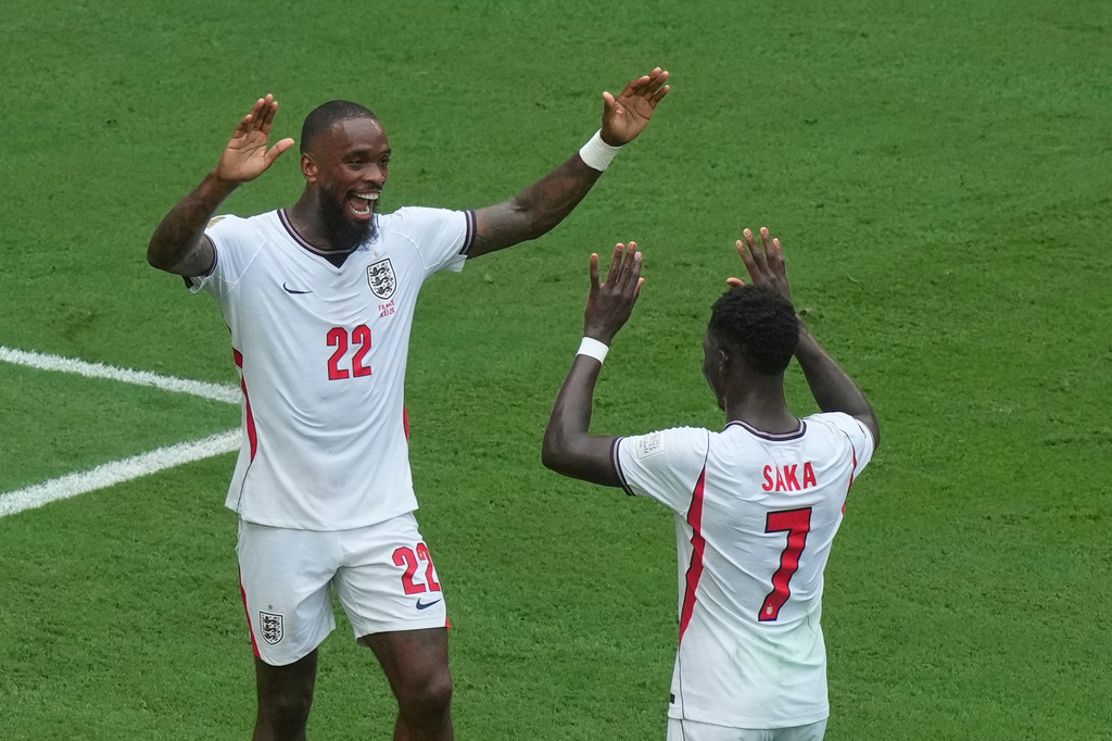 England's Bukayo Saka (7) celebrates scoring their third goal with Ivan Toney (22) during the World Cup third-place playoff soccer match between France and England in Miami Gardens, Fla., Saturday, July 18, 2026. (AP Photo/Marta Lavandier)